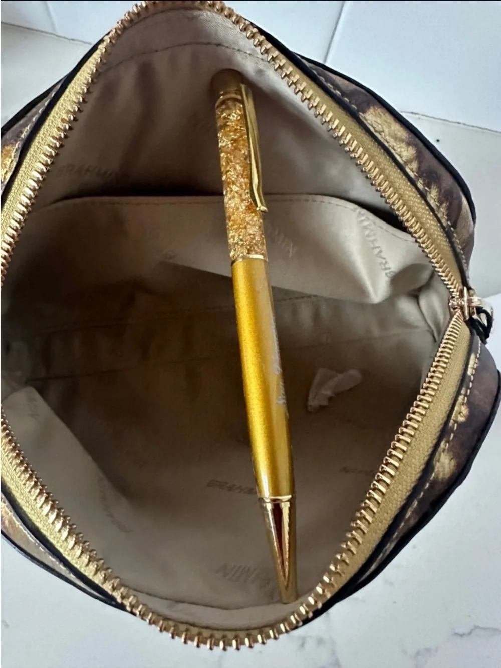 Brahmin Dany Gold and Brown Floral Embossed Leather Pouch